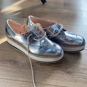 Silver platform sneakers